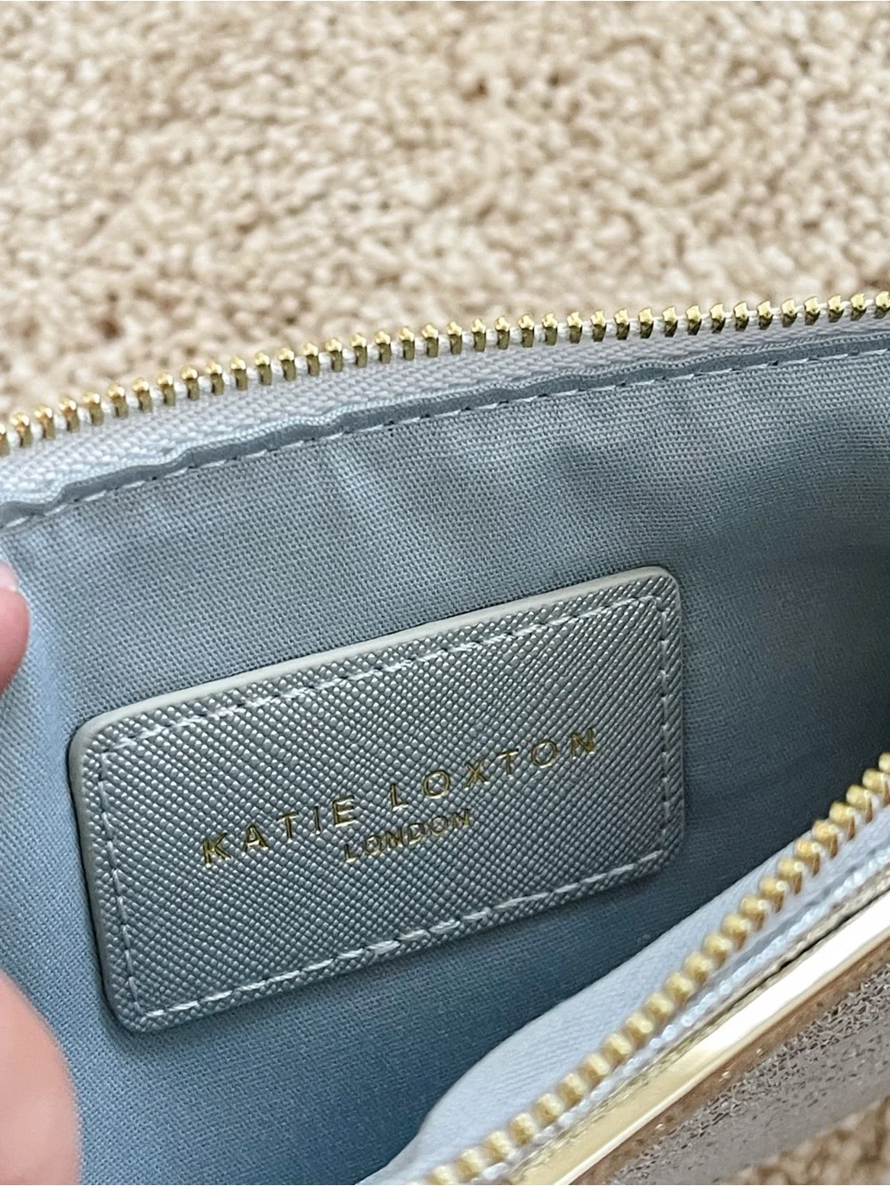 Set of three flat pouches by Estella Bartlett and Katie loxton